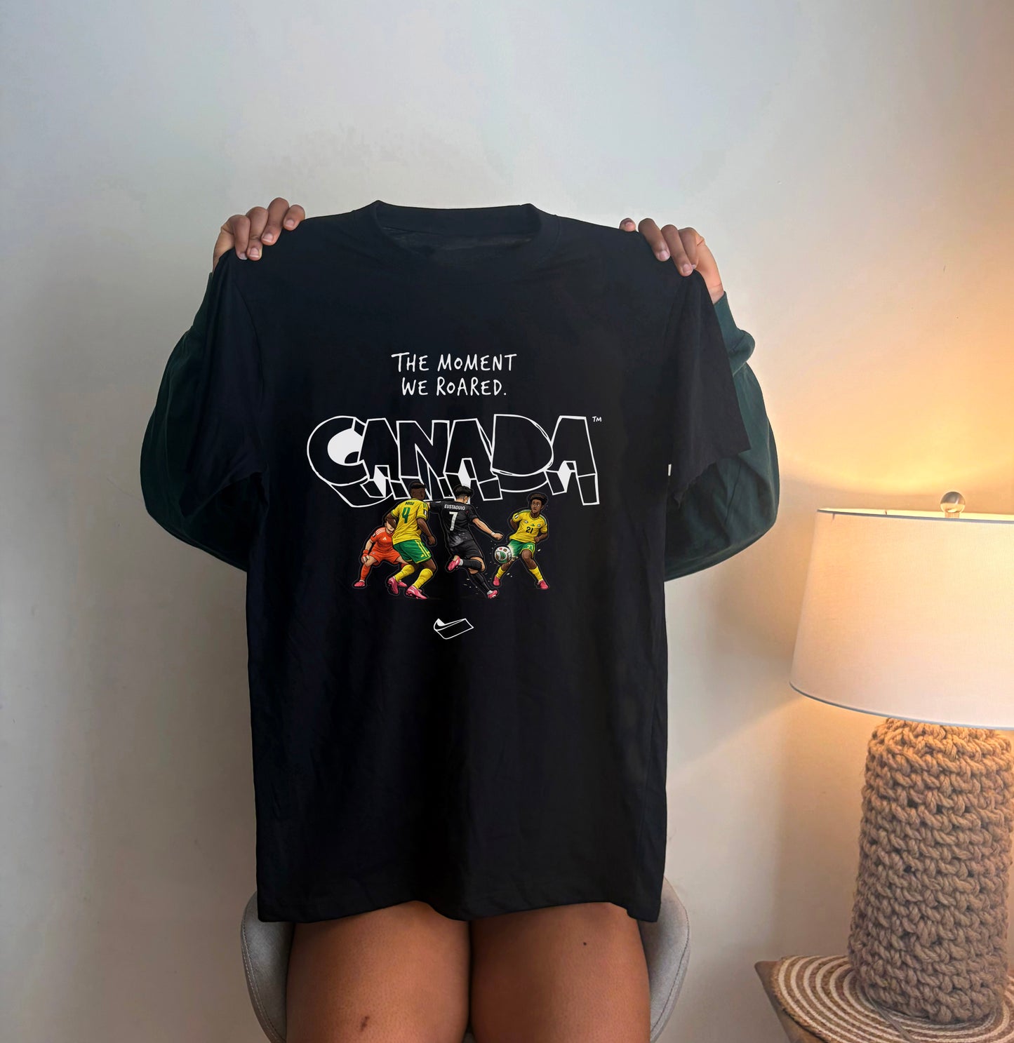 Black Canada Soccer graphic t-shirt featuring The Moment We Roared design for World Cup fans
