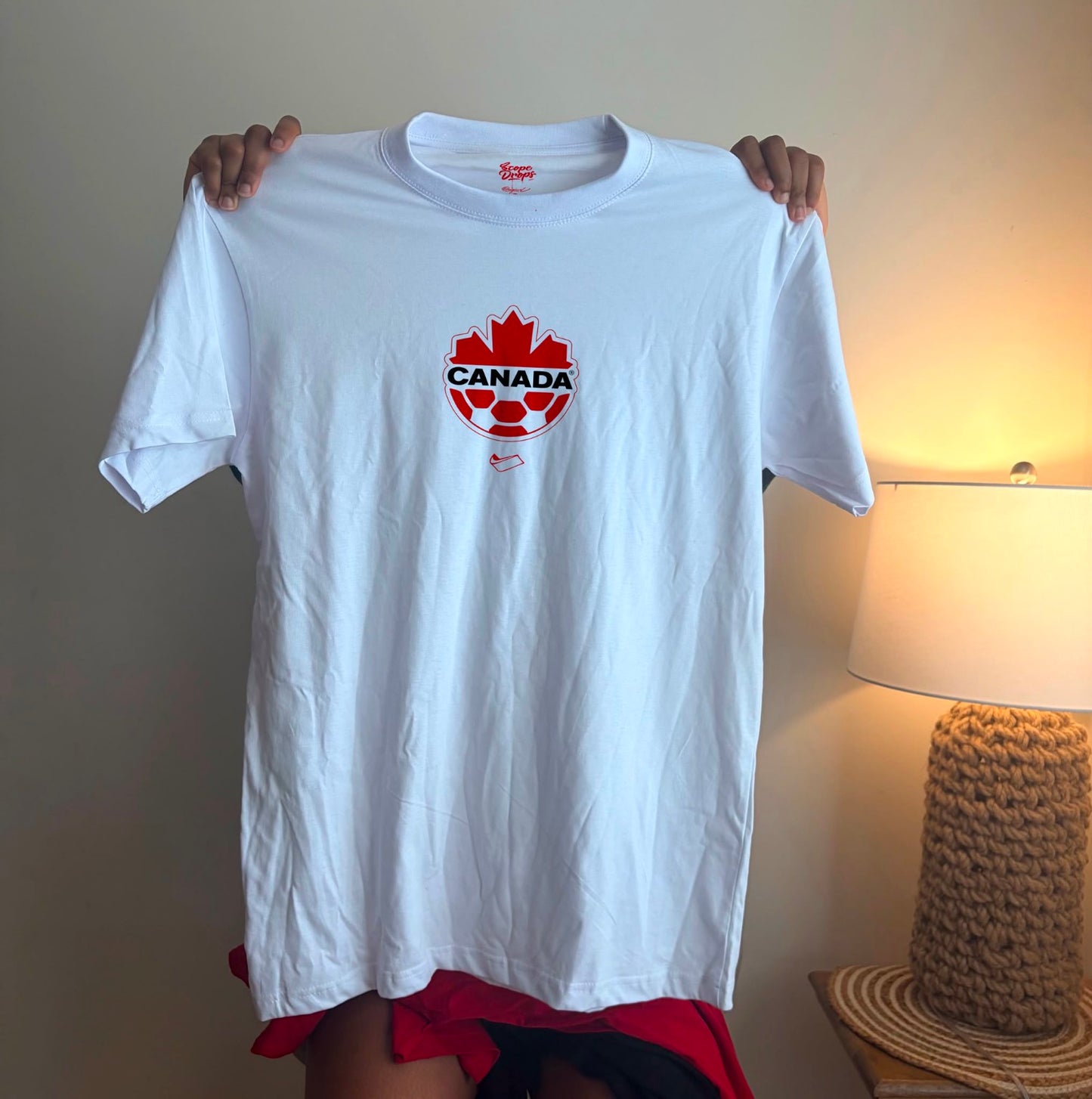 White Canada Soccer graphic t-shirt featuring The Moment We Roared design for World Cup fans
